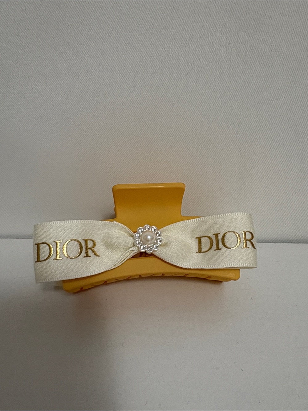 Dior Luxurious white and Gold Ribboned Hair Clip